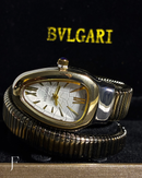 Relógio BVLG Feminino Dourado Algarismos Romanos Redondo